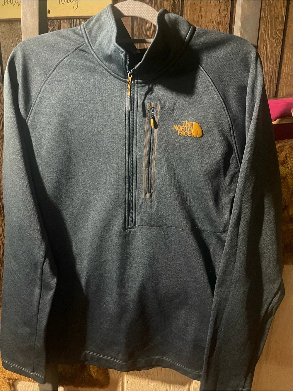The North Face Men's Charcoal Gray Half-Zip Fleece with Gold Logo